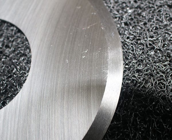 Applying oil to a cutter blade to prevent rust